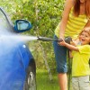 mother and son washing car in Desborough, Northamptonshire